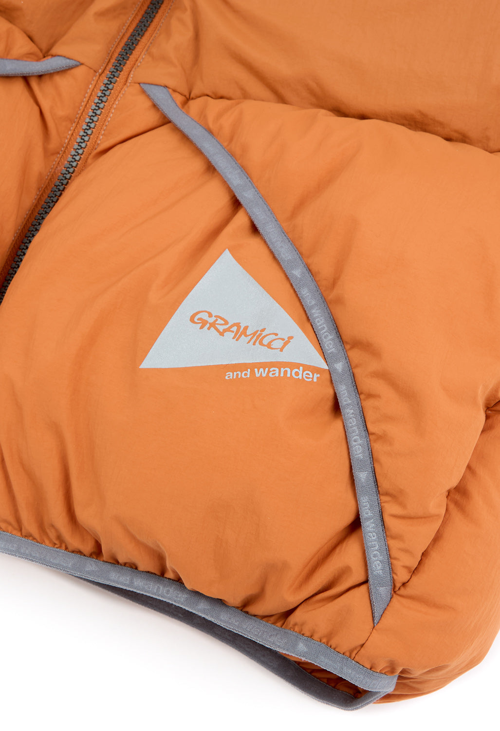 Gramicci x And Wander Down Vest - ORANGE